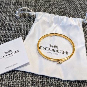 Coach bangle bracelet with latch